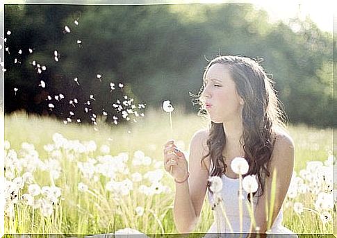 a woman in love on a meadow