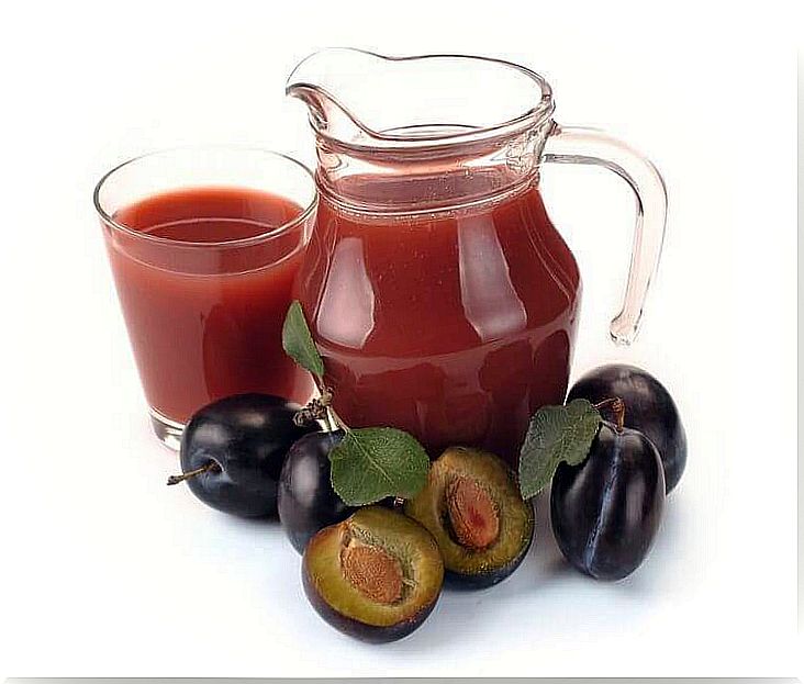 Plum juice in a jug