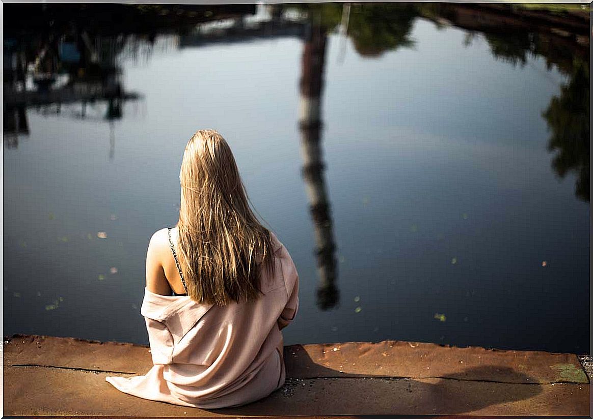 woman sitting alone