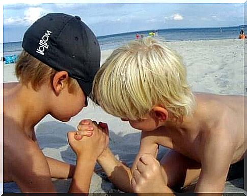 with children on the beach