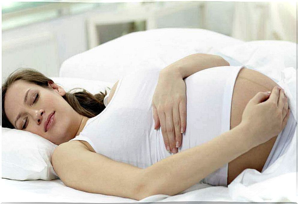 a pregnant woman sleeping on her back