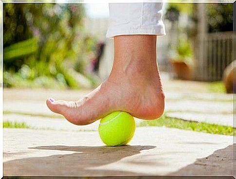 A tennis ball helps to treat plantar fasciitis