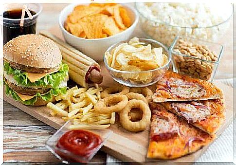 Excessive eating of junk food causes stomach problems and pain.